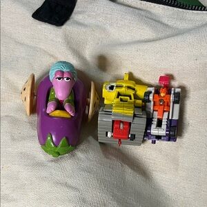 Purple and Yellow Toy Car Duo